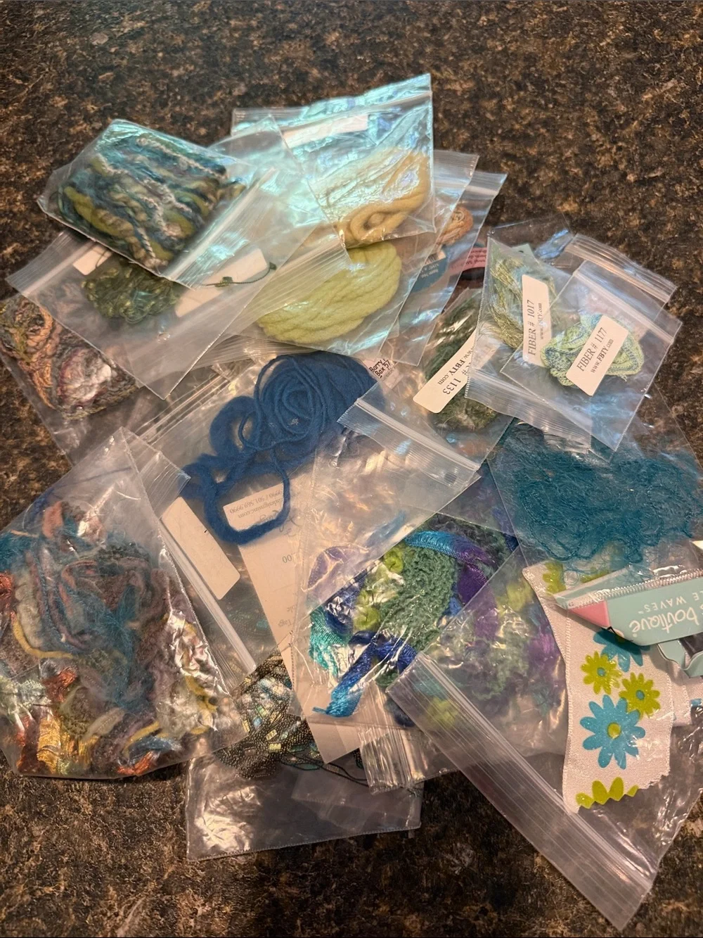 35 Assorted greens and teal  fiber trim packages